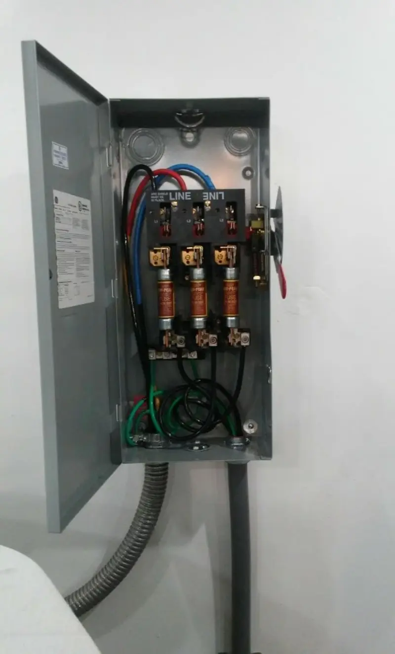 Three-phase disconnect switch installed for Smoke Detector Installation in Smithtown